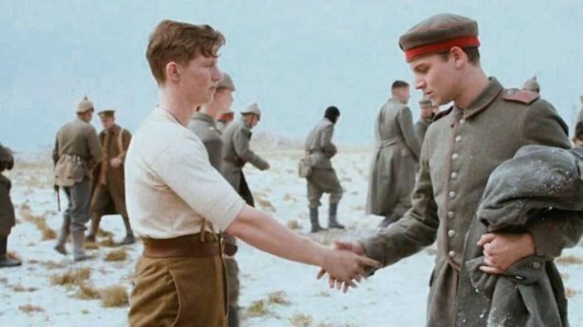 Two soldiers shaking hands in a snowy landscape, suggesting a truce or peaceful moment